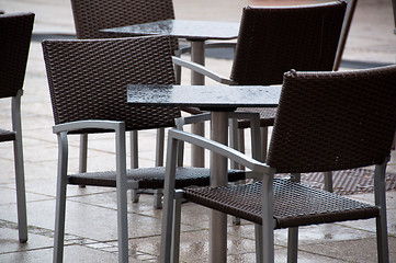 Image showing Wet Chairs And Tables Outside Cafe