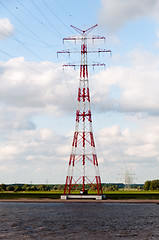 Image showing Huge Power Pole on blue sky background