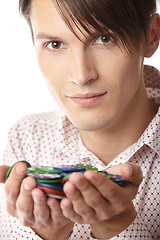 Image showing Man with casino chips