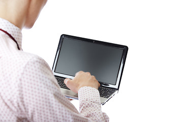 Image showing Using laptop