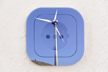 Image showing Conceptual: Wind Turbine over Power Outlet