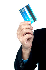 Image showing Cropped image of a man showing credit card