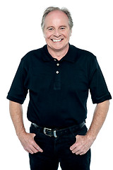 Image showing Profile shot of a casual smiling retiree