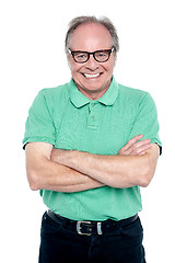 Image showing Studio shot of a cheerful elderly man