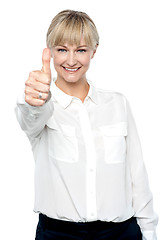 Image showing Successful businesswoman showing thumbs up