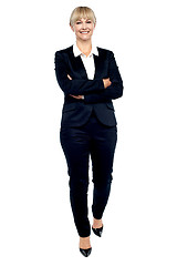 Image showing Gorgeous woman in business suit walking towards you