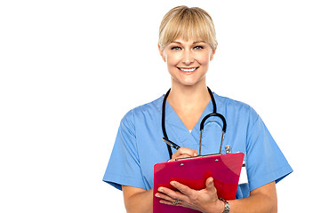 Image showing Shot of a cheerful doctor doing her rounds
