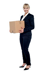 Image showing Female business executive relocating her office