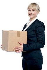 Image showing Corporate woman with a cardboard box in hand