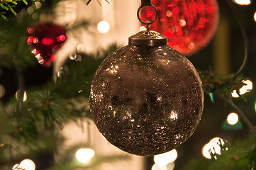 Image showing Christmas Balls Hanging From Christmas Tree