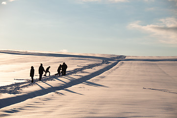 Image showing Walking in powder snow