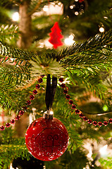 Image showing Christmas Balls Hanging From Christmas Tree