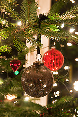 Image showing Christmas Balls Hanging From Christmas Tree