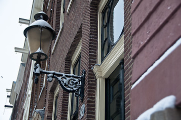 Image showing Snow covered street light