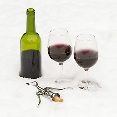 Image showing Bottle of red wine and wineglasses isolated