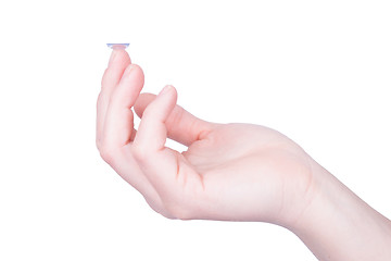 Image showing Woman holds a Contact Lens