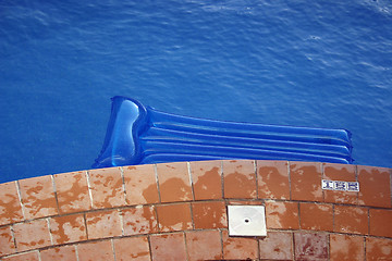 Image showing inflatable lilo on pool