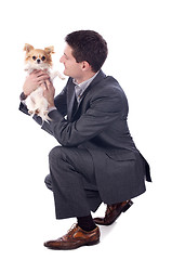 Image showing business man and chihuahua