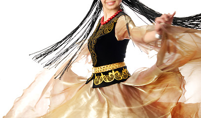 Image showing Smiling dancer in motion with long hair