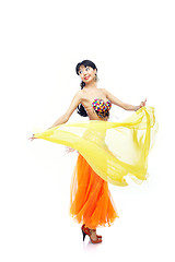 Image showing Belly dance with yellow fabric