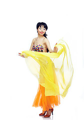 Image showing Belly dancer with yellow fabric
