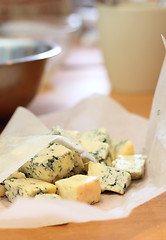 Image showing Pieces of a blue cheese on a kitchen