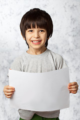 Image showing enthusiastic boy  with  placard