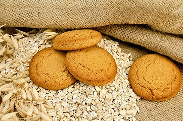 Image showing Oatmeal cookies with oatmeal on sacking