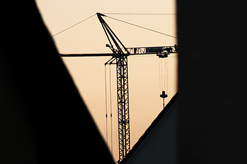 Image showing building crane during sunrise