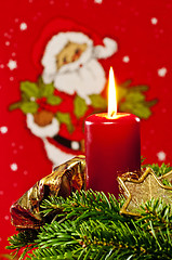 Image showing candle with Santa Claus