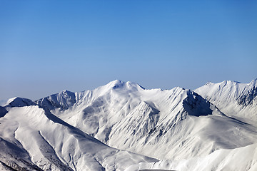 Image showing Snowy mountains and blue clear sky