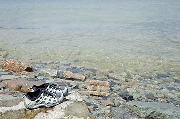 Image showing Shoes at coast