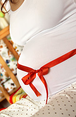 Image showing Beautiful pregnant woman tummy  