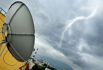 Image showing Parabolic antenna and lightning