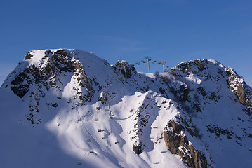 Image showing Mountains with a cable car in the far