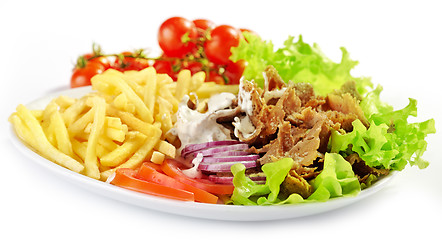 Image showing Plate of kebab and vegetables