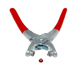 Image showing Riveter with red handles and one rivet
