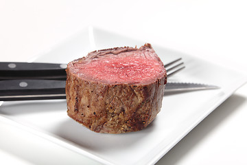 Image showing Chateaubriand steak and cutlery