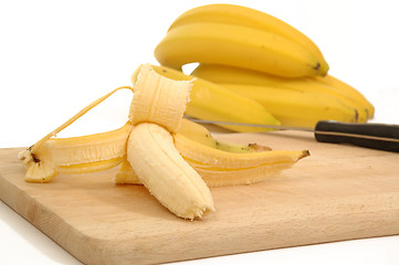 Image showing Bananas on a carving board