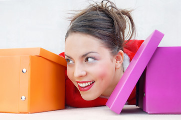 Image showing Happy lady with gift boxes