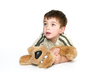 Image showing Child holding a plush toy