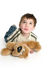 Image showing Child playing with stuffed toy