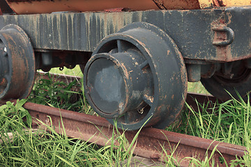 Image showing Rusty nonperforming industrial car on rails