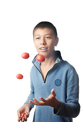 Image showing Juggler and tomato