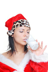 Image showing Santa drinking milk cocktail