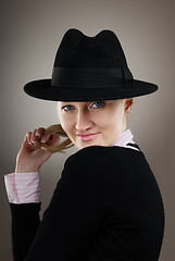 Image showing Coquette in black hat