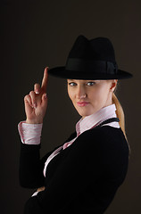 Image showing Black hat and pink shirt