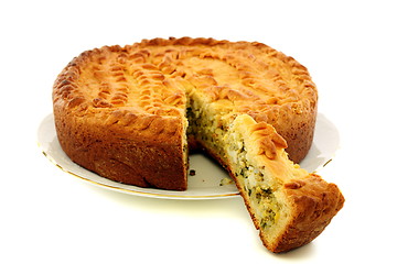 Image showing Pie filled with green onions and eggs. 