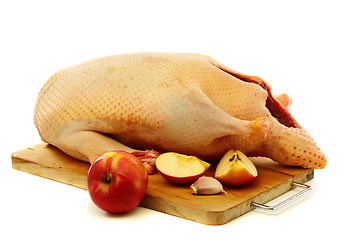 Image showing Cooking duck with apples.