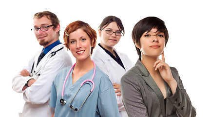 Image showing Young Mixed Race Woman with Doctors and Nurses Behind